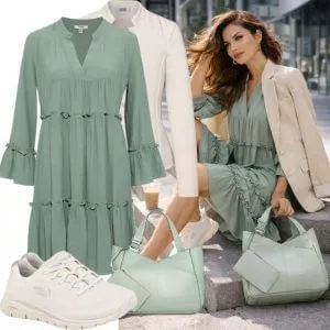 Sommer Outfits Stilvolle Frau im urbanen Sonnenlicht